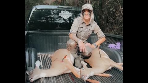 Hartwell resident and rookie hunter Makenzie Clark proudly displays the result of her first ever bow shot.