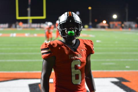 Malachi Kelley poses for the camera after scoring his second touchdown of the night.