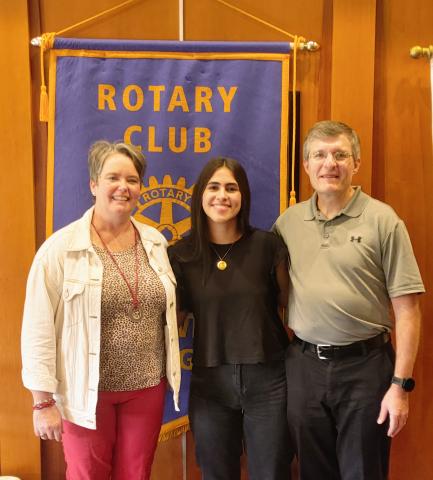GRSP student and Colombian-native Catalina Velez Aristizabal stands alongside her Hartwell hosts Marcie and Joe Garringer. 
