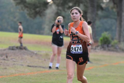Melody Bloomberg eyes the finish line in Hart's home meet Sep. 30.