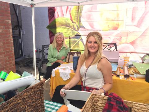 Amelia and Alexis Hays show off their fashion line at the Hartwell Makers Festival.