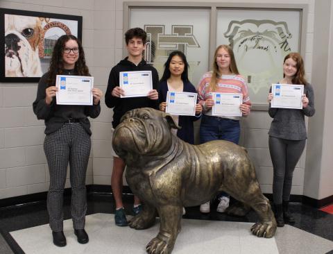 AP Scholar students (from left to right) Mary Elizabeth Jackson, Tate Phillips, Huong Pham, Cassidy Gaines, and Lindsey Waldvogle pose with their certificates. 