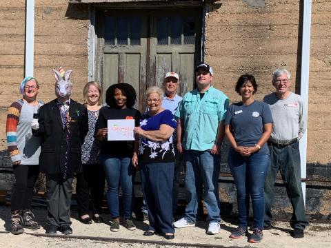 Pictured left to right are HCCT and TORCH board members Lani Sessoms, Morgan Haymes (Harvey), Kerri Prutt, Ayoca Freeman,  Mary Gidley, Christopher Milford, Lenford Smith, Kristin Joyner and Larry Torrence. 