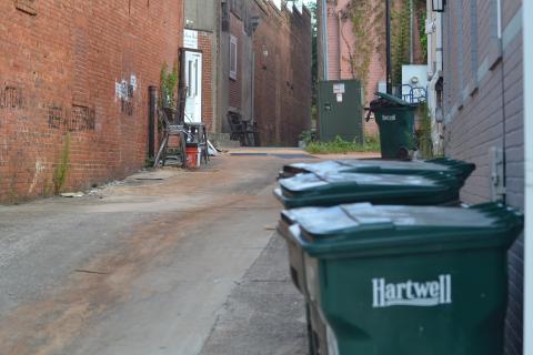Constitution alley between Depot and Howell streets, seen above, has an untick in trash accumulation in recent years that the city and businesses are working to eliminate.