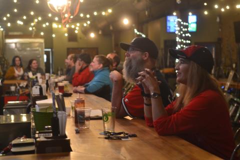 Fans of the Atlanta Braves fill the bar at Southern Hart Brewing in Hartwell on Tuesday night, watching the late innings of the Braves’ first World Series title in 26 years.