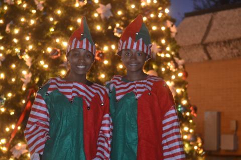 Sisters Trinity (left) and Morgan Carter Freeman (right) smiling as bright as the Hartwell Christmas tree at the town’s annual tree lighting ceremony held Monday, Nov. 22. 