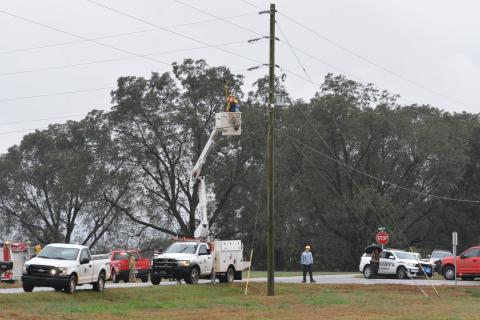 A technician fixes a power line moments after it was entangled with a boom truck, causing a man to be electrocuted. 
