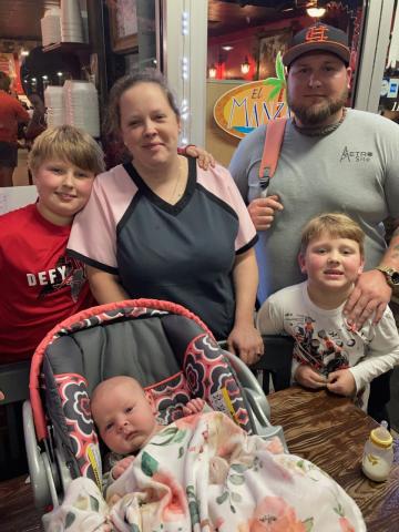Lauren and Alex Emmons with their three children.