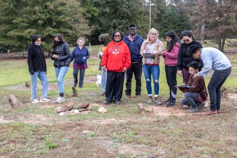 From left to right, Kassadi Saunders, Sara Castro, Ellen Davenport, Zainab Saccoh, Diane Merritt, Howard Curry, Emily Dukes, Pooja Bangera, Rosanna Cruz-Bibb, Aries Aviles, and Flavio Salgedo Avila. The team was assembled to research the grave site outside Harmony Grove Baptist Church in an attempt to add it to the National Historic Register. 