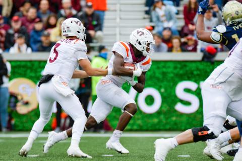 Malachi Thomas takes a hand off against Georgia Tech on Saturday, Oct. 30.