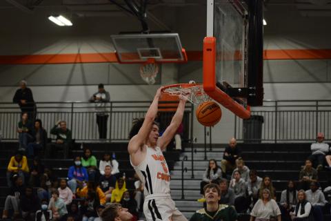 J.C. Curry shows his athleticism by dunking on the tall rim protectors from Rabun Gap-Nacoochee.