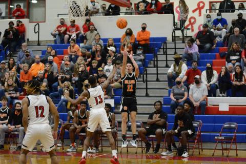 Photo From File J.C. Curry puts up a three-pointer against Sandy Creek on March 5, at Sandy Creek High School.