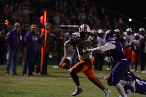 Malachi Kelley fights off a defender in the team’s loss to Monroe Area on Nov. 5.