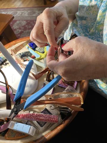 Carolyn Mann hard at work in her home.