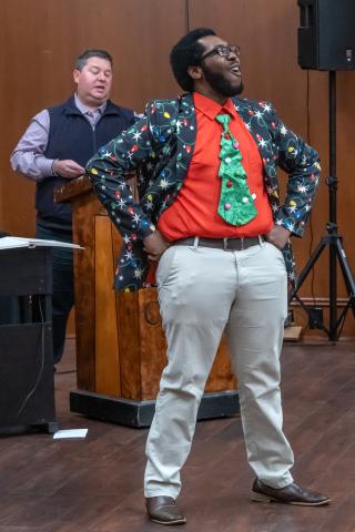Pictured left: singer Rickey Eberhardt belts out a solo. 