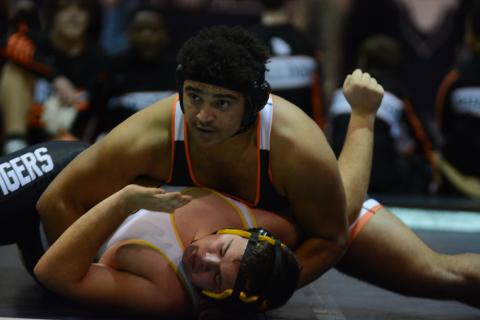 Quanterrio Hyman looks to referee for the pin against his Crescent opponent on Wednesday, Dec. 15.