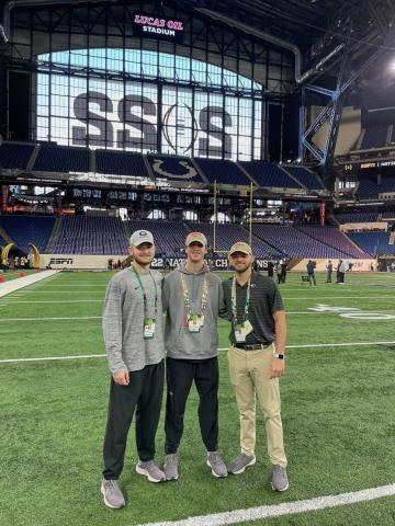 Former Hart County High Schoolers and Georgia football equipment managers (from left to right) Kirby King Carter Banks Preston Mewborn stand field level at Lucas Oil Stadium before Monday night’s national championship game.   