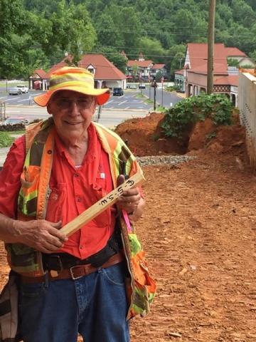 Teasley hard at work doing what he loves as the county surveyor. 