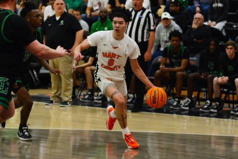 Johnny Curry drives to the rim in Hart’s win over Franklin County on Jan. 26.