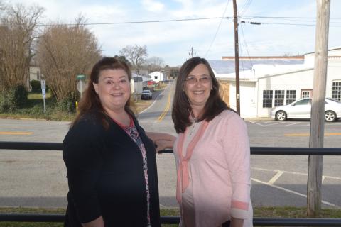 Dan Hunt/The Hartwell Sun - Women Build ambassador Michelle Wetherbee, left, alongside Hart County Habitat director Darlene Nixon, right.  