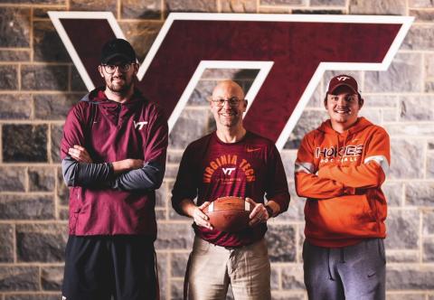 Stewart Carter, middle, alongside assistants Rex Bennett (left) and Hayden Whitley (right).