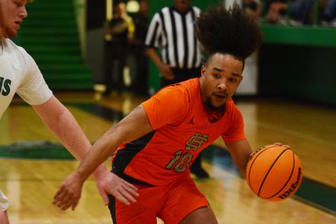 Sean Teasley uses speed to out-maneuver the physical defense.