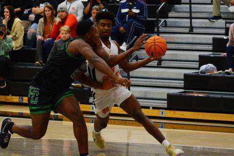Tahj Johnson drives through the Franklin County defense. 