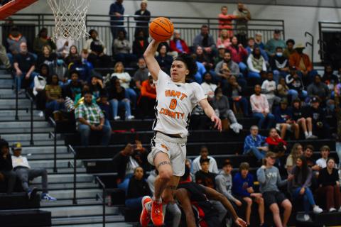 Johnny Curry slams down a dunk in the team’s 63-49 win over Stephens County on Friday, Feb. 4. 