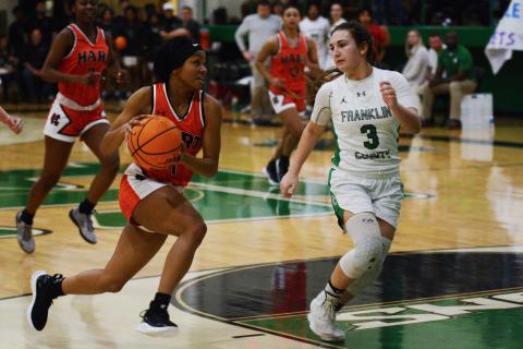 Drew Dotson/ The Hartwell Sun Valasha Carter drives to the basket against Franklin County on the road.