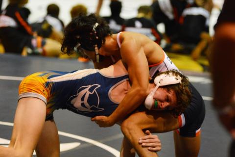 Miguel Jaimes fights for control with an Elbert County wrestler earlier this season. 