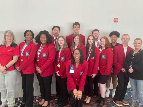 Pictured from left to right are, back row, Ethan Ho, Jonathan McClain, Ivan Martin, Louiesa Gibbs, middle row, Advisor Ms. Vicky Carter, Terriah Bush, Zion Lackey, Bella Chapman, Anna Hunt, Georgia Tucker, Savana Kotal, Sawyer Boyd, Advisor Erica Robertson and, front row, Arionya Gude. 