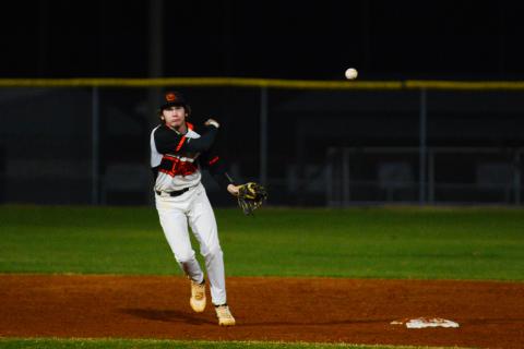 Zach Dombrowsky throws a runner out in the win over Banks County on March 1.