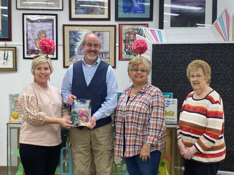 Pictured is Angie Brown, Hart EMC Director of Public Relations, Richard Sanders, (center) Director of Hart County Library, Tina Simmons and Linda Haley, (right) Hart County Farm Bureau.  