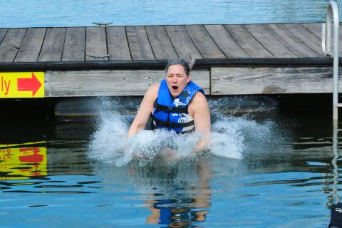 Jodi Simmons braves the chilly Lake Hartwell water for the first time on Saturday.