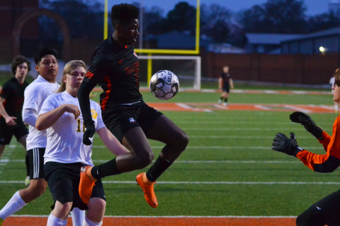 Chaston Lewis flies through the air in a match against Crescent earlier this season. 