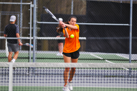 Ryleigh Jordan return a shot in her win against Monroe Area.