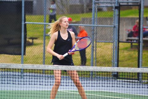 Ava Carnes awaits the return in her match against Stephens County on March 15.