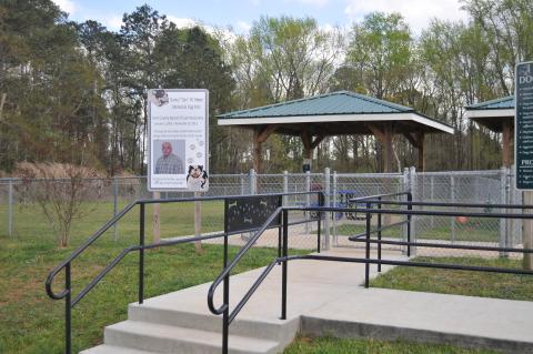 Pictured above is the Dan W. Reyen Memorial Dog Park, which offers dog owners a place to relax while their pets socialize and play off the leash.  