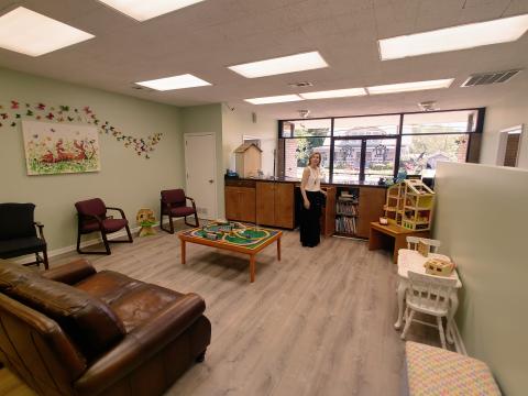 Harmony House CEO Laurie Whitworth inside the playroom and child center on site. 