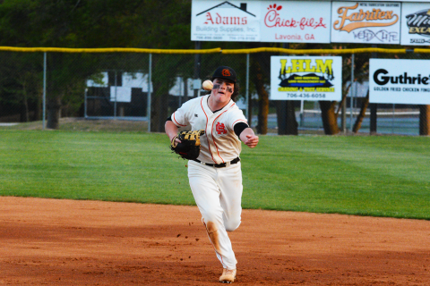 Drew Dotson/ The Hartwell Sun - Peyton Powell tosses the ball to first to get the second-to-last out against Stephens.