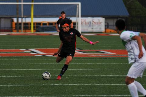Tyler Trujillo scores a goal on a free kick earlier this season. 