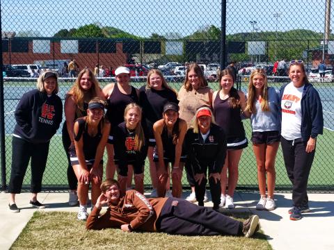 The girls tennis team advanced to the first round of the state tournament. 
