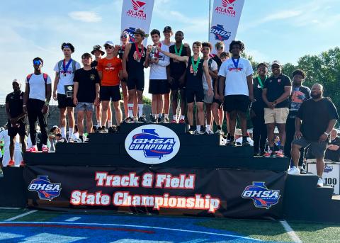 Hart County’s boys track team celebrates a second place team finish and several individual achievements at the conclusion of the state championship meets on Saturday, May 14.   