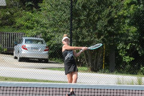 Posie Phillips receives private lessons with Kristen Summers to refine her skills. 