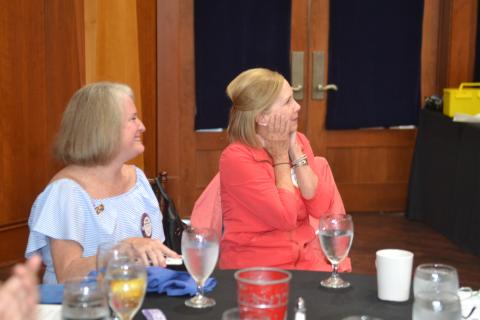 Dan Hunt/The Hartwell Sun DruAnn Williams, right, is shocked upon hearing the news that she was selected for the prestigious Four-Way Test Award. Williams, right, is pictured above at the May 26 Rotary meeting alongside best friend Debbie Kulcsar.
