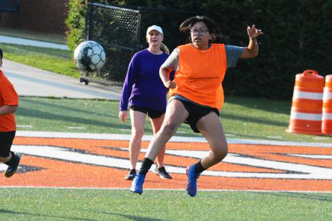 Kami Martinez hits a volley to score a goal.  