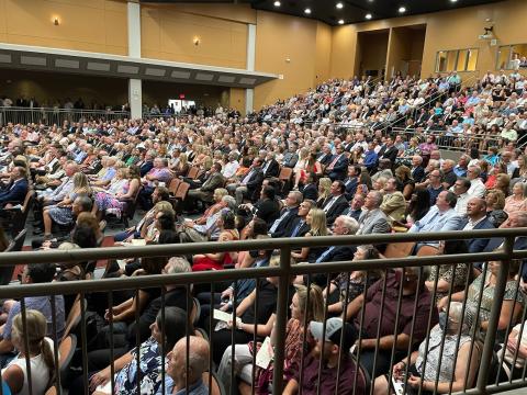 Hundreds of mourners gathered Sunday to honor the memory of Charly and Kelli Schell at the Lonnie Burns Fine Arts Center.