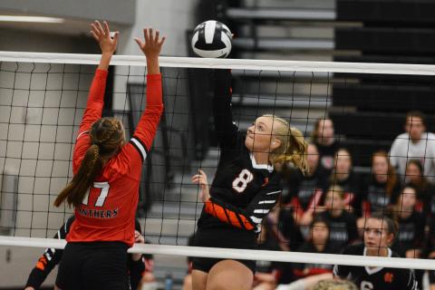 Cali Beebe goes for the kill against Jackson County on Aug. 18.