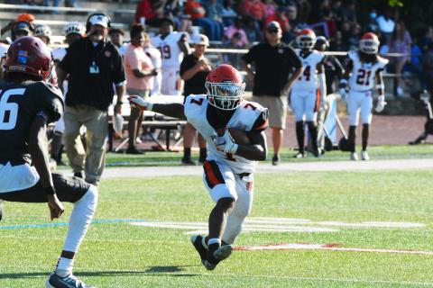 Nori Moore cuts to reverse field and score a touchdown against Westside on Aug. 12. 