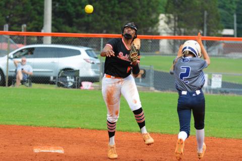 Jazania Shealer throws to first to try to get the double play after tagging second against Elbert County on Tuesday, Aug. 16. 